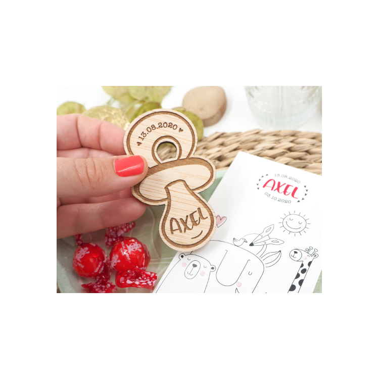 Iman de madera en forma de chupete