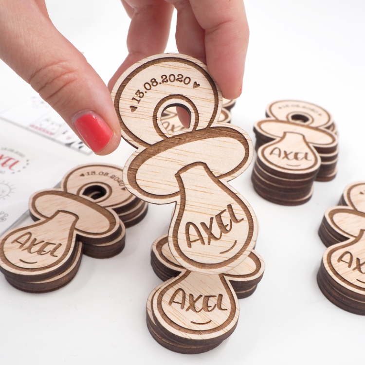 Iman de madera en forma de chupete